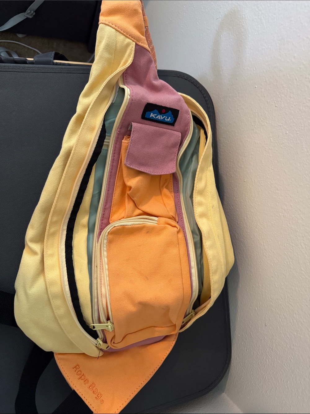 Kavu Rope Sling Bag in Yellow, Orange & Pink